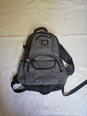 Eastpak Black Patterned Men's Backpack - Durable Everyday Bag